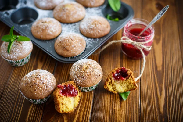 Sweet baked muffins with jam inside — Stock Photo, Image