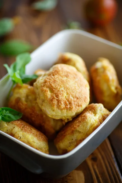 Fried cutlet in ceramic form — Stock Photo, Image