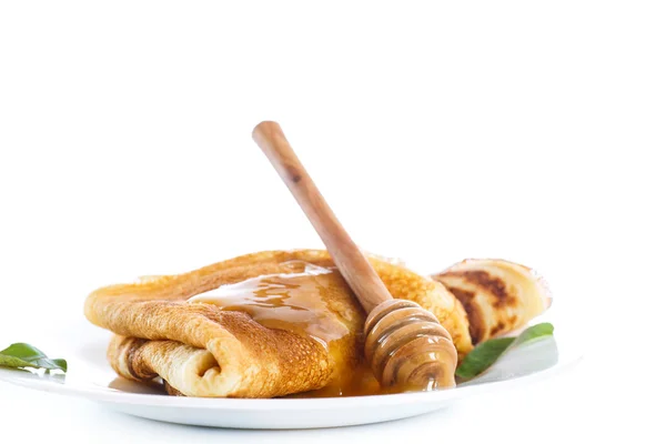 Thin pancakes with honey — Stock Photo, Image