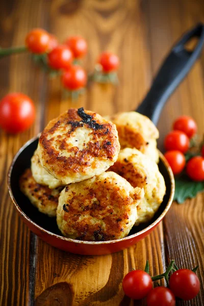 Fried chicken cutlet with cherry tomatoes — Stock Photo, Image