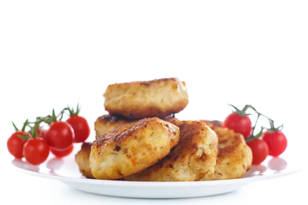 Fried chicken cutlet with cherry tomatoes — Stock Photo, Image