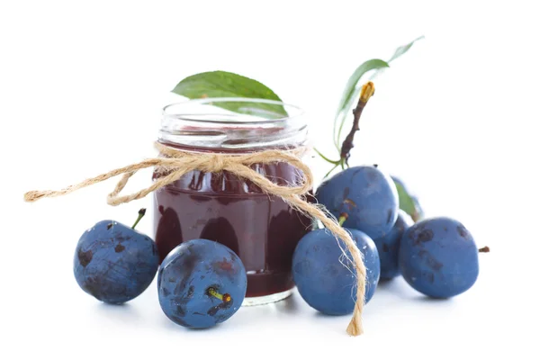 Plum jam in a glass jar — Stock Photo, Image