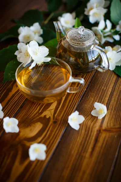 Jasmine tea in a glass pot — Stock Photo, Image