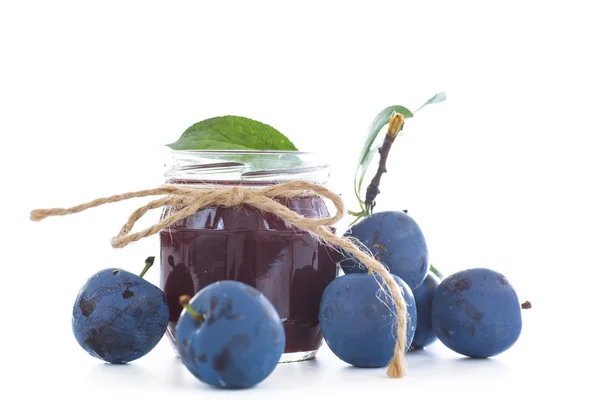 Plum jam in a glass jar — Stock Photo, Image