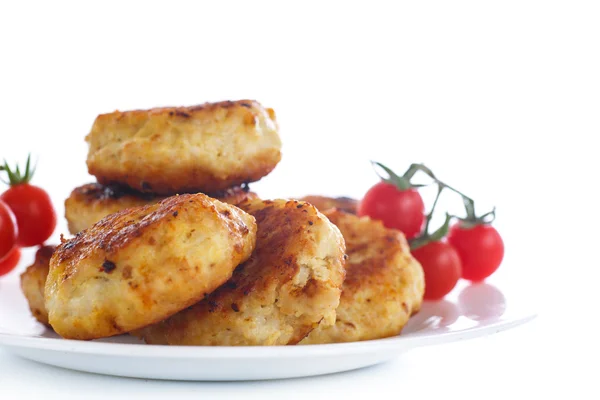 Fried chicken cutlet with cherry tomatoes — Stock Photo, Image