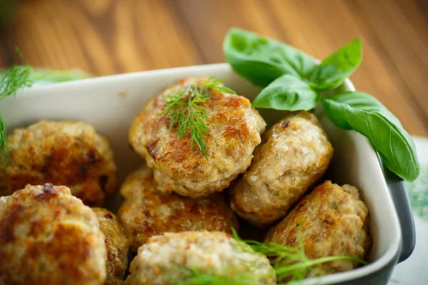 Fried cutlet in ceramic form — Stock Photo, Image