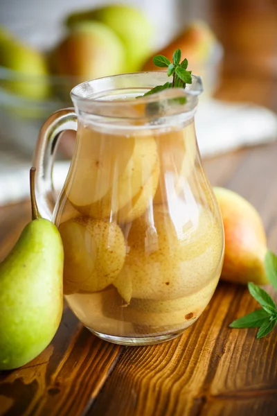 Sweet pear compote in a decanter — Stock Photo, Image