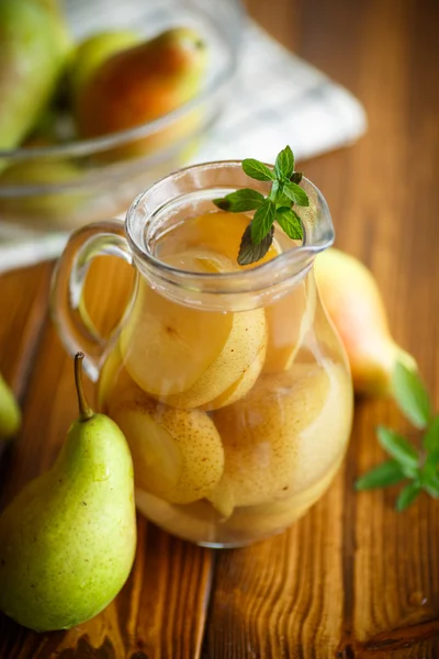 Sweet pear compote in a decanter — Stock Photo, Image