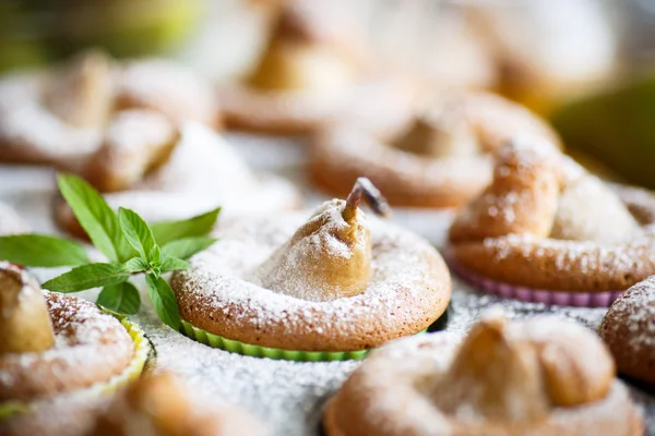 Sweet muffins with pears — Stock Photo, Image