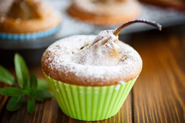 Sweet muffins with pears — Stock Photo, Image