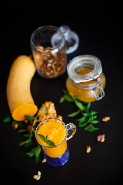 Pumpkin smoothie with nuts and honey — Stock Photo, Image