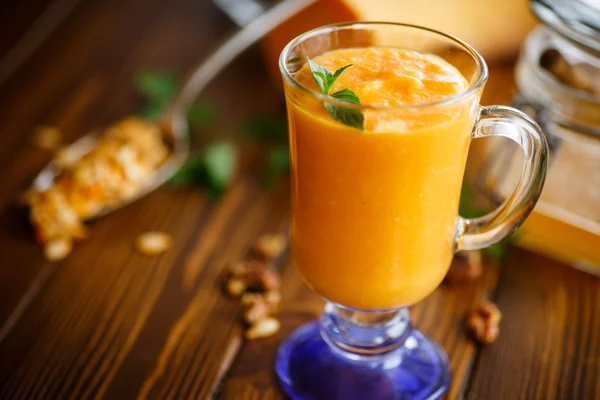 Pumpkin smoothie with nuts and honey — Stock Photo, Image