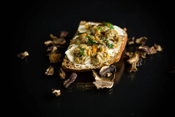 Home cooked natural mushroom caviar from forest dried mushrooms isolated on black background — Stock Image Home Cooked Natural Mushroom Caviar Forest Dried Mushrooms Isolated Black Stock Image
