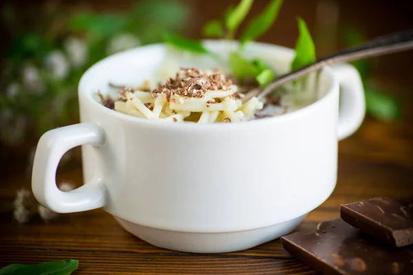 Sweet Noodles Milk Grated Chocolate Bowl Wooden Table — Stock Photo, Image