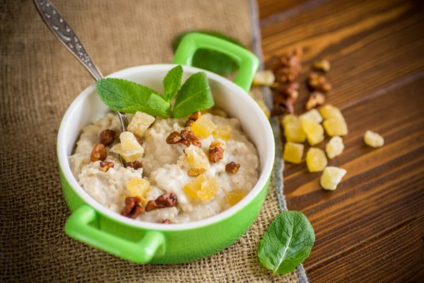 Cooked Boiled Sweet Oatmeal Nuts Candied Fruits Bowl Wooden Table — Stock Photo, Image