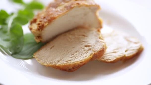 Baked chicken fillet pieces with spices and herbs, in a ceramic form — Stock Video