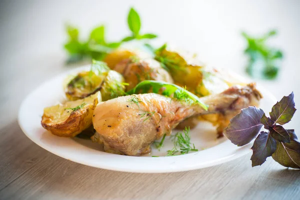 Baked Chicken Leg Early Potatoes Zucchini Wooden Table — Stock Photo, Image