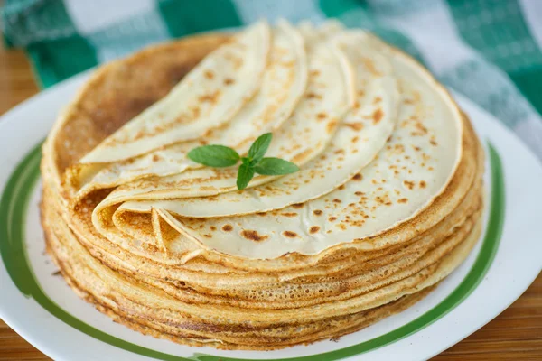 Many thin pancakes Royalty Free Stock Images