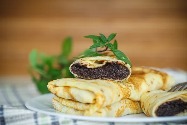 Sweet pancakes with poppy seeds — Stock Photo, Image