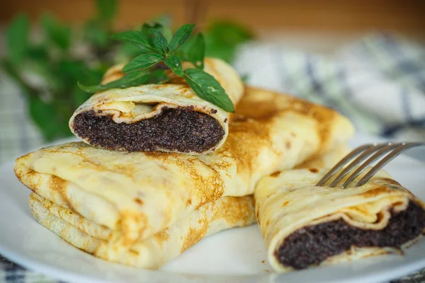 Sweet pancakes with poppy seeds — Stock Photo, Image