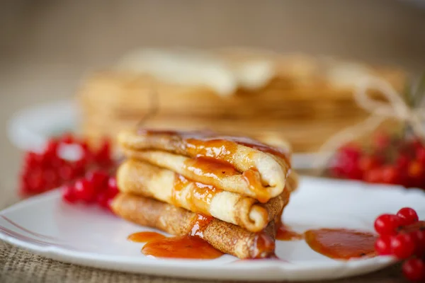 Pancakes with jam viburnum — Stock Photo, Image