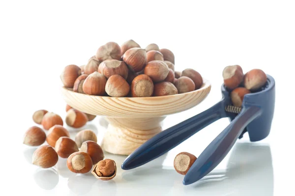 Hazelnut in the wooden plate — Stock Photo, Image