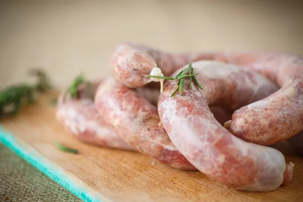 Crude homemade beef sausage — Stock Photo, Image