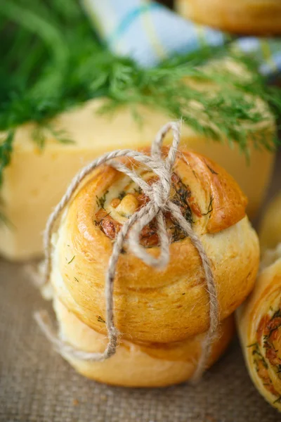 Bun with cheese and herbs — Stock Photo, Image