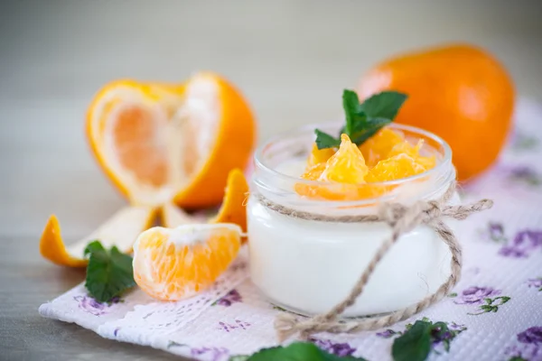 Yogurt with mandarin oranges — Stock Photo, Image