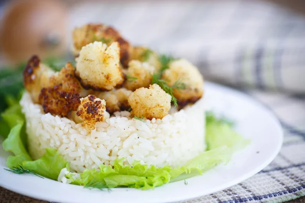 Fried cauliflower with boiled rice — Stock Photo, Image