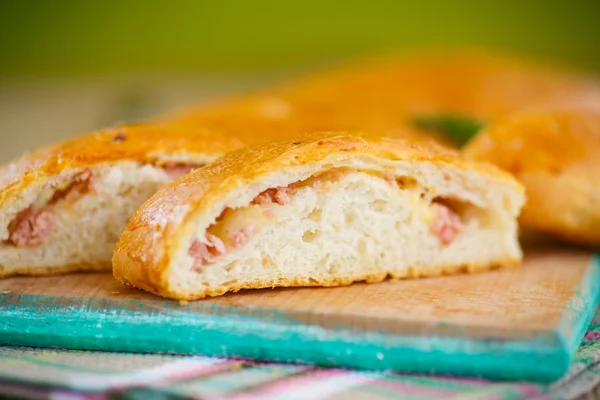 Baked bread stuffed with cheese — Stock Photo, Image