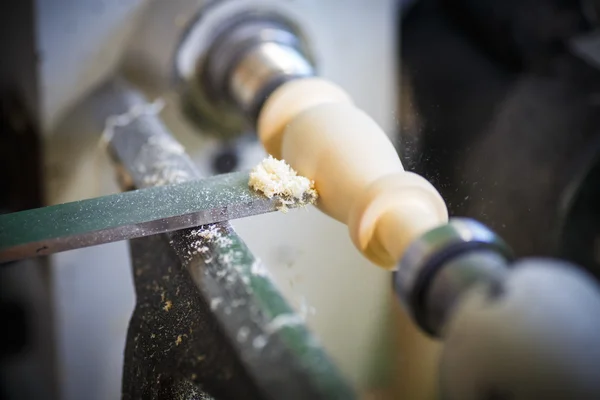 Hand with a chisel in the course of the woodwork — Stock Photo, Image