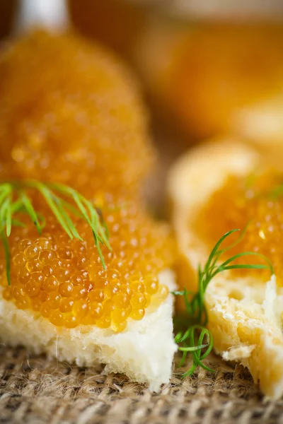 Bread spread with salted pike caviar — Stock Image Bread spread with salted pike caviar Stock Image