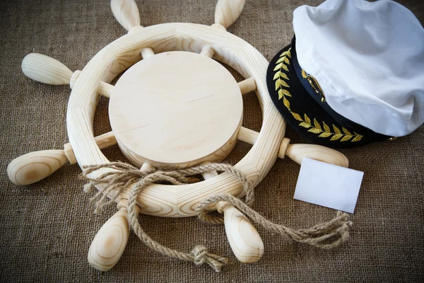 Wood steering wheel with a rope — Stock Photo, Image