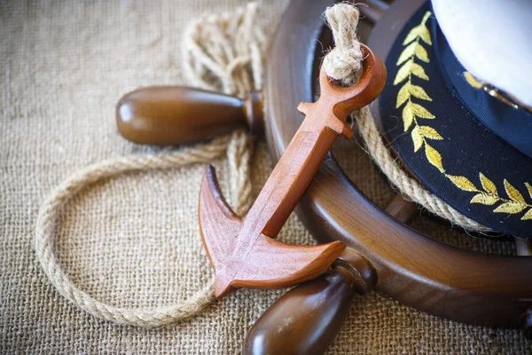 Decorative wooden ship anchored at the helm — Stock Photo, Image