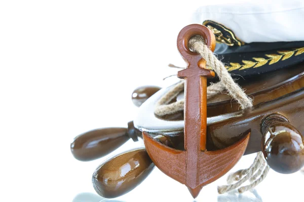 Decorative wooden ship anchored at the helm — Stock Photo, Image