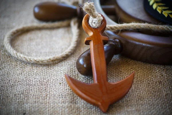 Decorative wooden ship anchored at the helm — Stock Photo, Image