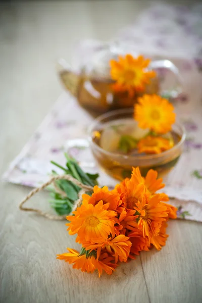 Herbal tea with marigold flowers — Stock Photo, Image