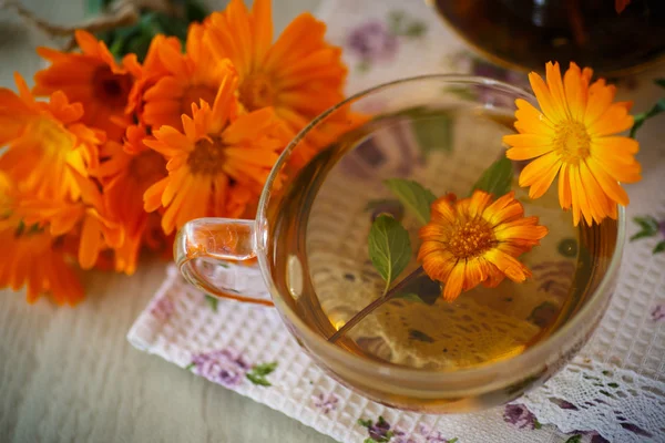 Herbal tea with marigold flowers — Stock Photo, Image