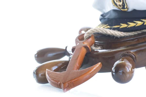 Decorative wooden ship anchored at the helm — Stock Photo, Image