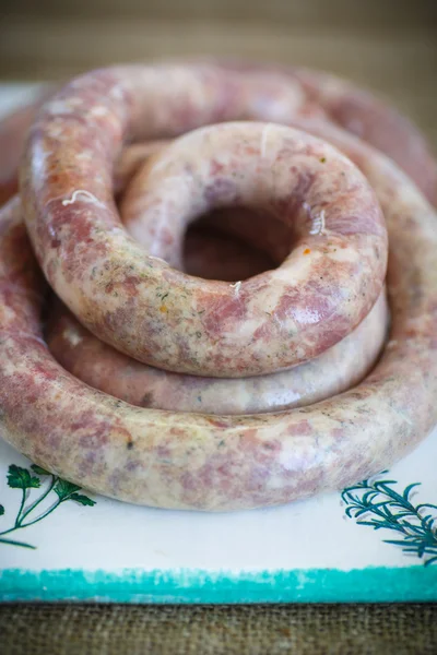 Homemade sausage with raw meat — Stock Photo, Image