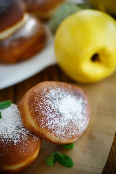 Donuts with quince filling sprinkled — Stock Photo, Image