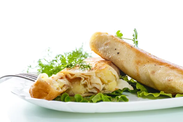Fried stuffed spring rolls on a plate — Stock Photo, Image
