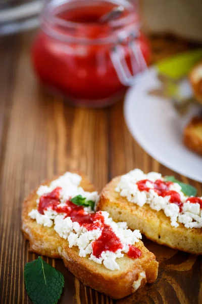 Fried in batter toast with cream cheese and jam — Stock Photo, Image