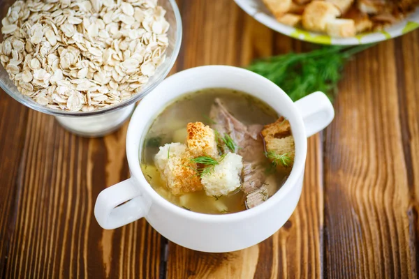 Oat soup with croutons — Stock Photo, Image