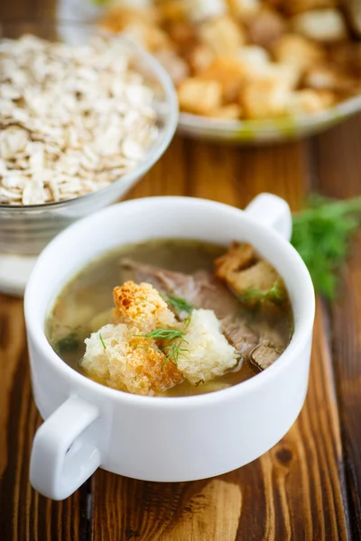 Oat soup with croutons — Stock Photo, Image