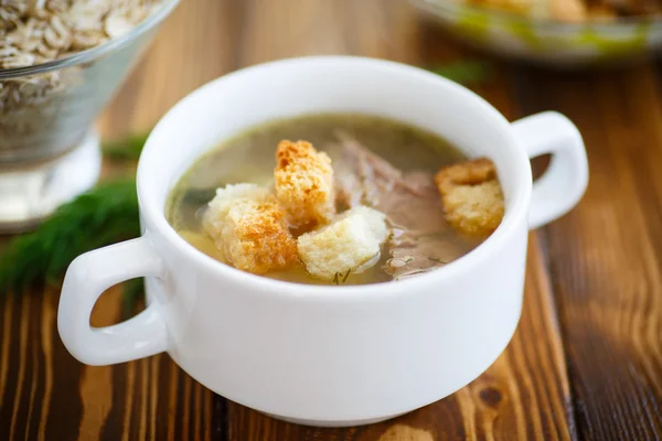 Oat soup with croutons — Stock Photo, Image