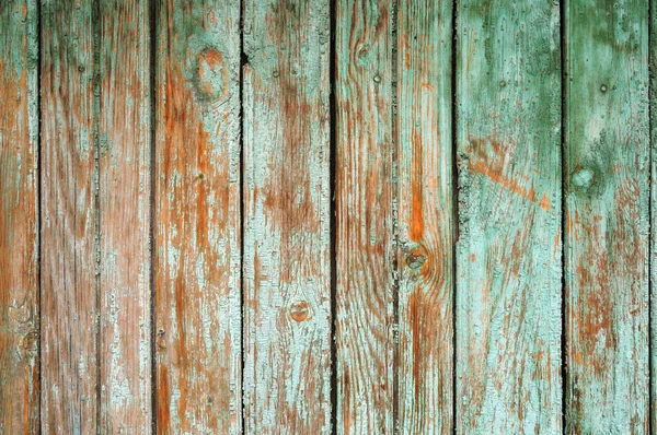 Fond composé de vieilles planches de bois avec des traces de peinture pelante. photo partiellement teintée . — Photo