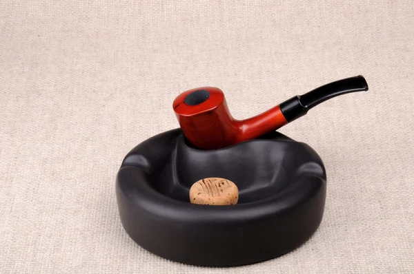 Accessories for smoking. Pipe and ceramicAshtray