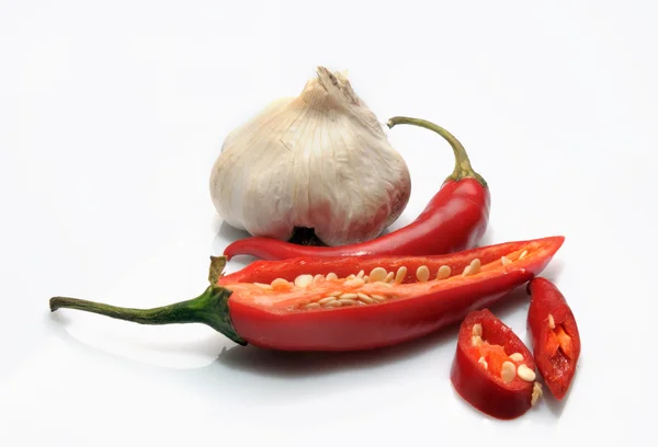 Garlic Red Chili Peppers White Background — Stock Photo, Image